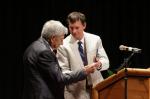 Getting his diploma
