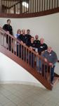 Volunteers pray and work during Day of Service
