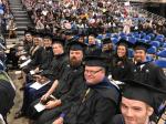 Father 'Dusty' Burns earns Master's Degree in Bioethics