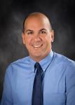 Reitz Memorial athletic director earns national recognition