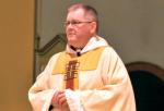 Father Mullen greets students, invites them to thank Father Gregory