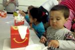 Westside Catholic preschoolers make Christmas Candy Cottages