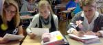 Students enjoying pen pals as part of first-year Spanish 1