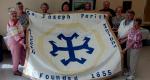 Father Zgunda receives quilt