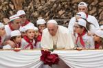 As pope turns 81, kids entertain with song, dance and 13-foot pizza