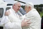 Pope Francis embraces emeritus Pope Benedict XVI